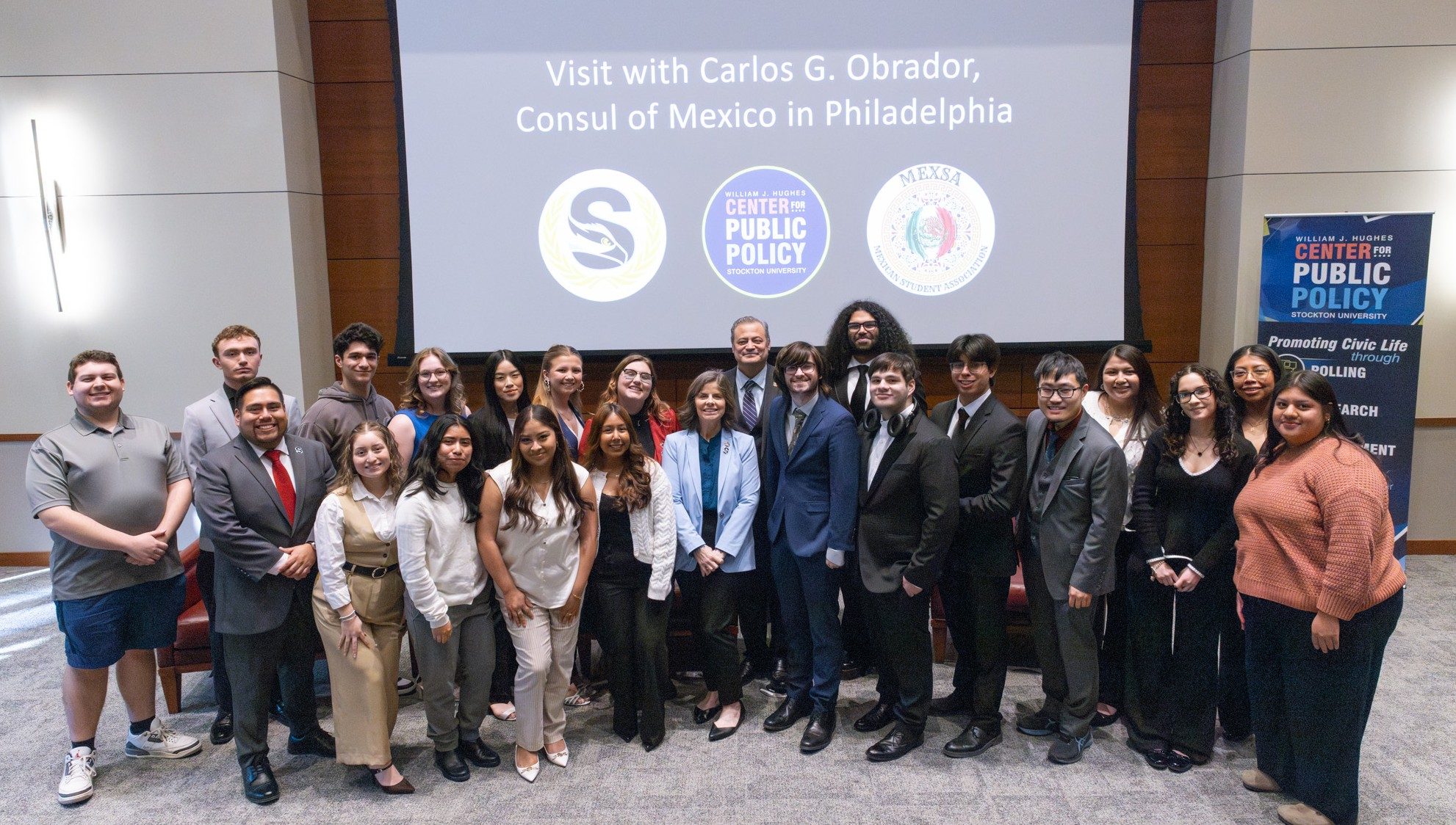 students and staff with Carlos G. Obrador, consul of Mexico 
