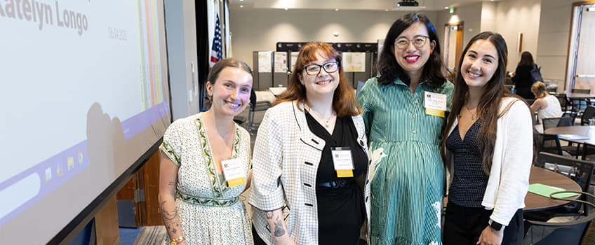 Associate Professor of Psychology Kaite Yang with students 