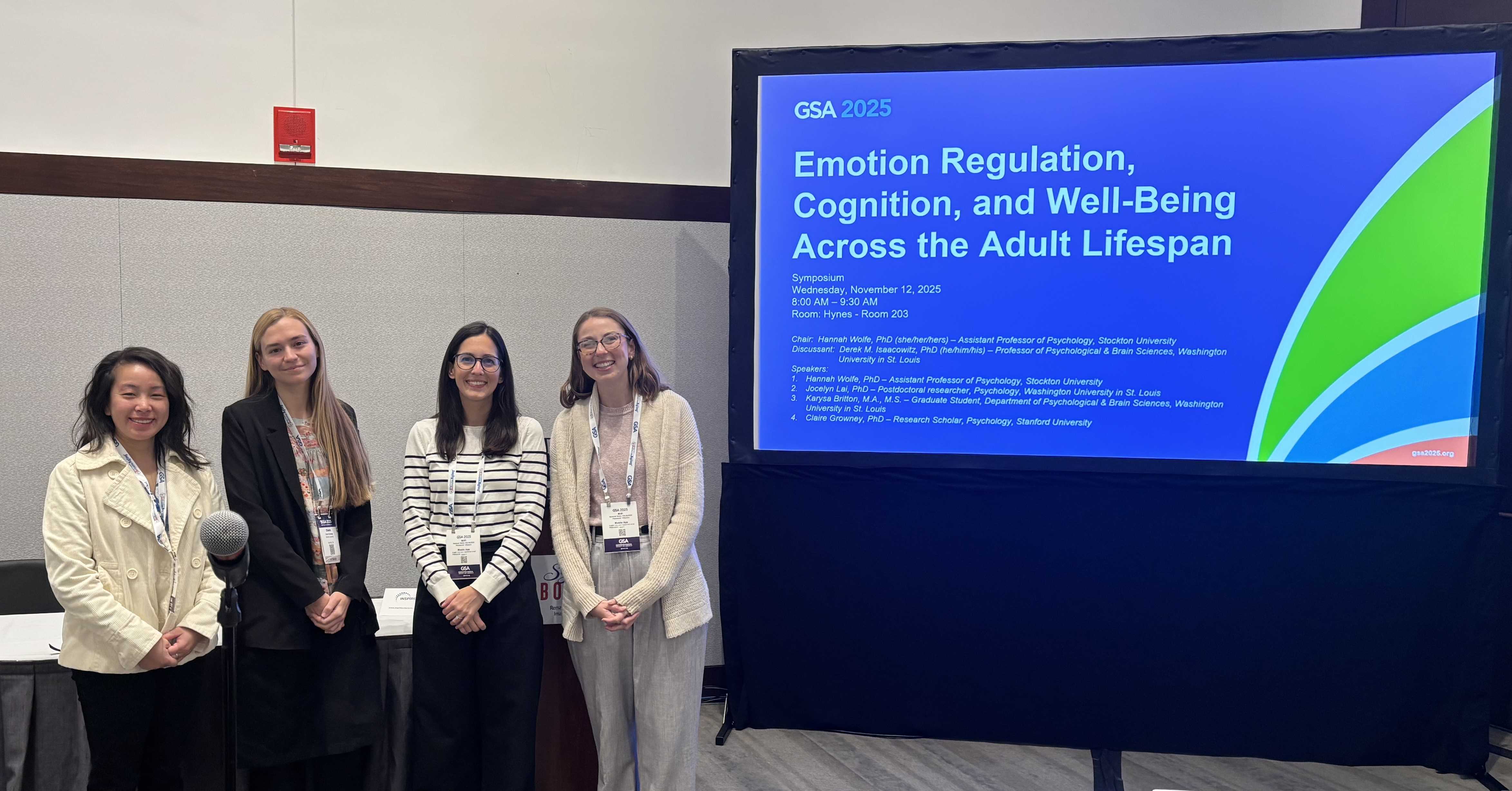 four presenters at symposium