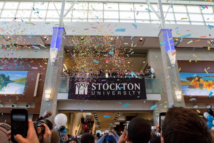 Confetti raining down a crowd as Stockton's new designation was announced
