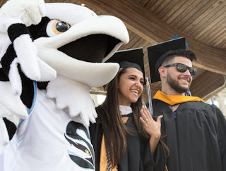 Scott Scerbo, a Business graduate, got down on one knee to propose to his Stockton sweetheart Catherine Dell Elba, an Education graduate, at Kennedy Plaza.