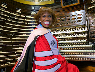 Beverly Vaughn, professor of Music, at the organ at Boardwalk Hall during Stockton’s Commencement ceremony on May 12.