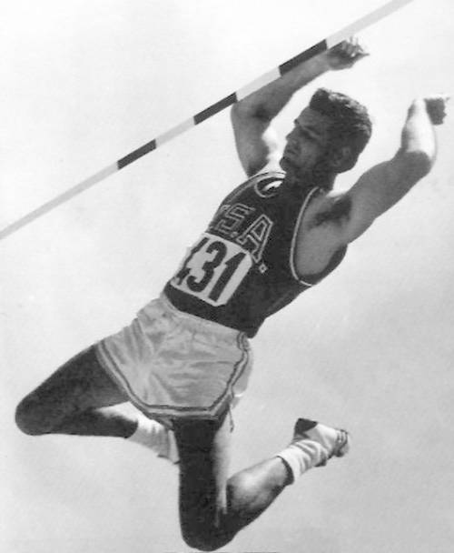 black and white photo of Don Bragg mid-pole vault