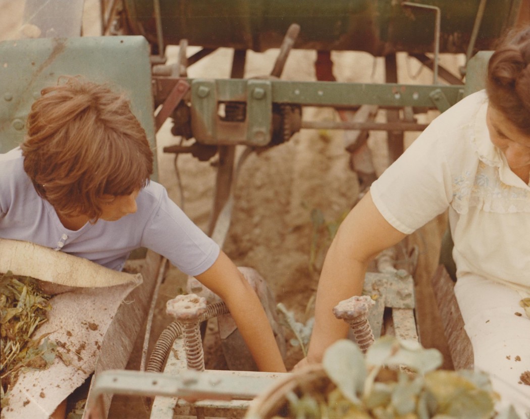 Lynn Kennedy and her mother Fern picking in the field.