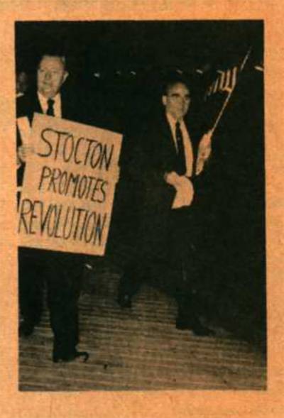 Reverend Carl McIntire marched on the Boardwalk holding sign that says, "Stockton Promotes Revolution"